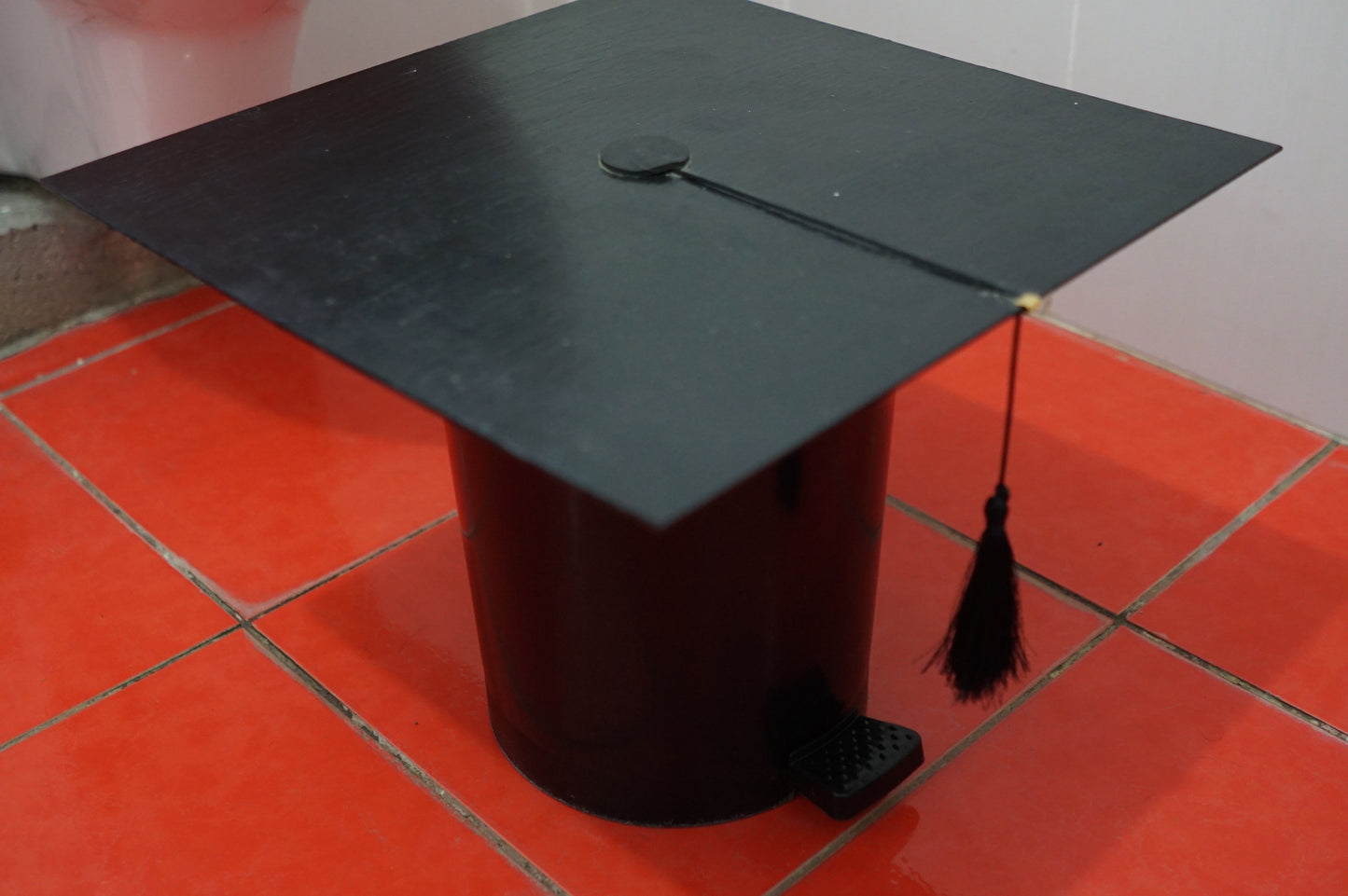 Trash Bin Squat Mortarboard